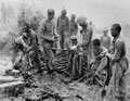 Indian and Gurkha soldiers inspect captured Japanese ordnance, Burma Campaign, 1944