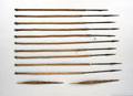 Mau Mau reed shafted arrows with some barbed 'wire' iron arrow heads and bound nocks, Kenya, 1953 (c)
