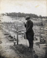 A member of the Women's Army Auxiliary Corps in a graveyard at Etaples, France, 1918
