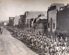 Indian troops marching through New Street, Baghdad, 1917