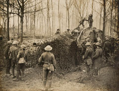 A tank towing a camouflaged heavy artillery piece, 29 November 1917