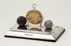 Paperweight incorporating finds from Wandiwash (1760) and Perambakkam (1780)