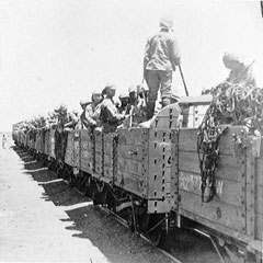 British soldiers aboard railway wagons, 1900 (c)