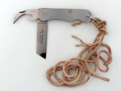 Clasp knife attached to a piece of string, 1981 (c)