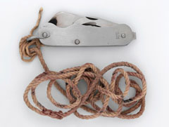 Clasp knife attached to a piece of string, 1981 (c)