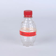 Bottle of 'Bum-Cola', Bosnia, 1998 (c).