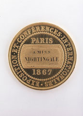 Gold medal issued by the Société Française de Secours aux Blessés des Armées de Terre et de Mer, presented to Florence Nightingale in 1867