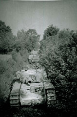 A Churchill AVRE in close country, Normandy, 1944