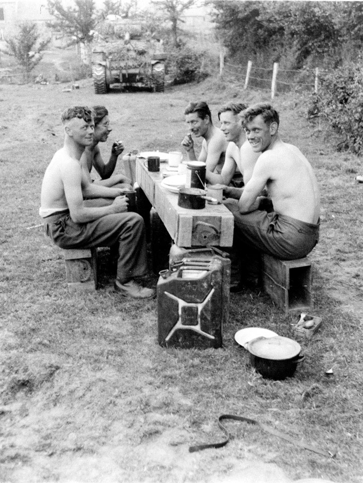 A British tank crew's evening meal, Vernay, France, 1944