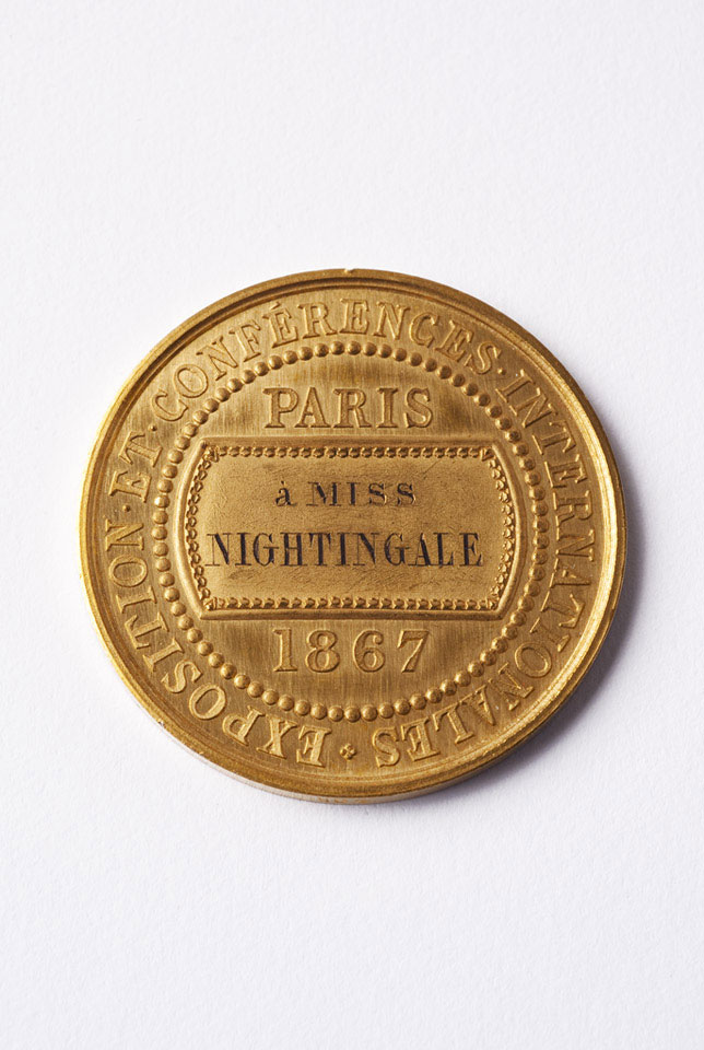 Gold medal issued by the Société Française de Secours aux Blessés des Armées de Terre et de Mer, presented to Florence Nightingale in 1867