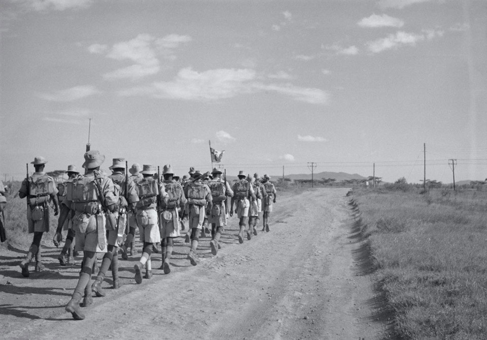 Platoon of  4th Battalion, King's African Rifles, on a route march near Gilgil, Rift Valley, Kenya, 1956 (c)