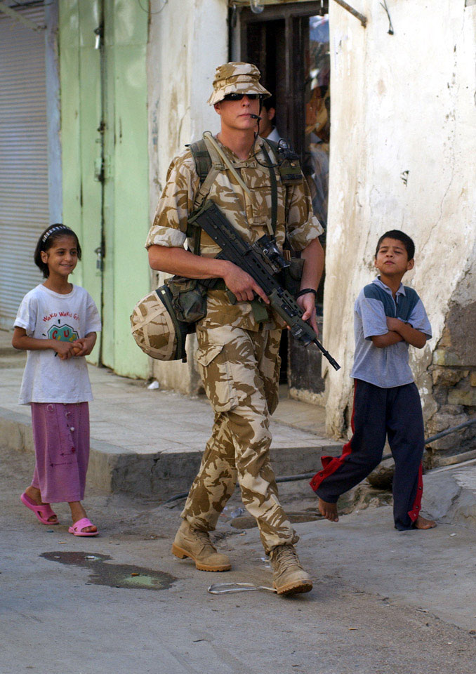 Patrolling the streets of Al Amarah, Iraq, July 2004