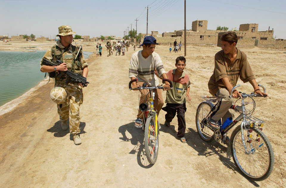 Patrolling the village of Jadeed al-Muallamin, Iraq, July 2004