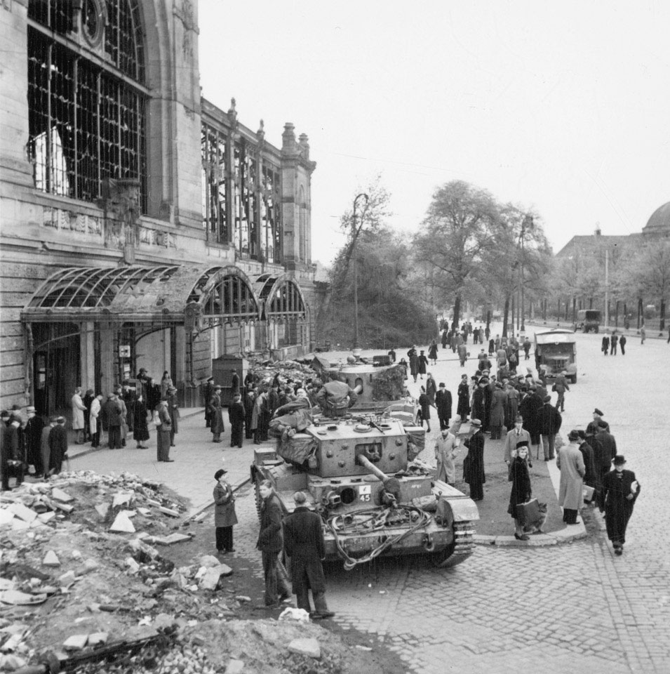 German civilians gather around British tanks in occupied Hamburg, 5 May 1945