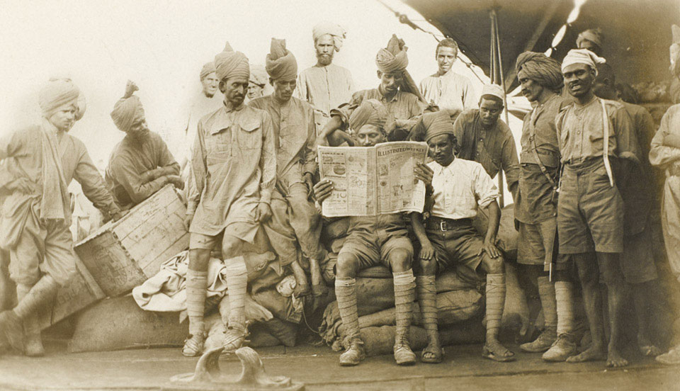 Indian Army troops travelling upstream on a barge, Mesopotamia, 1916 (c)