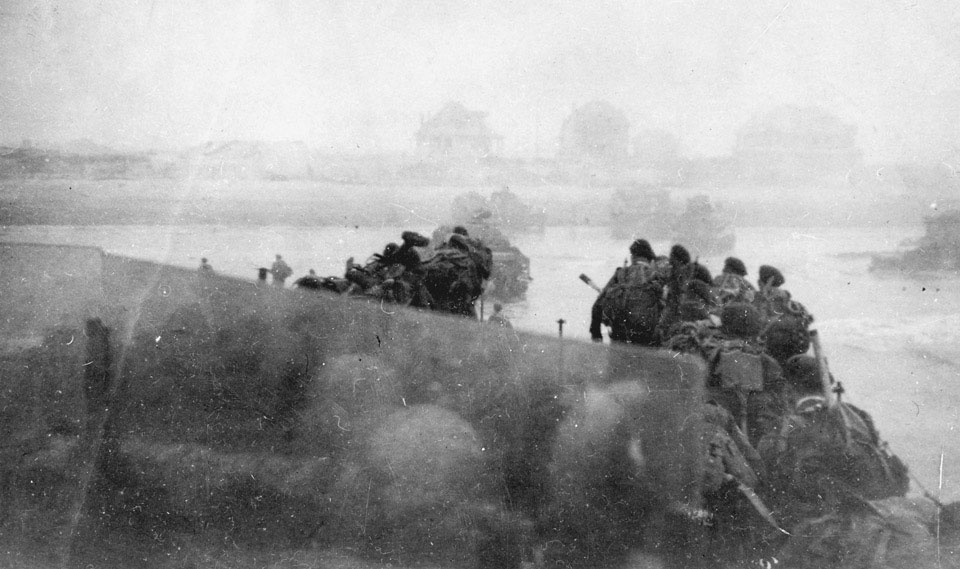 British troops emerging from landing craft near Ouistreham and Bernieres, Sword Beach, 6 June 1944