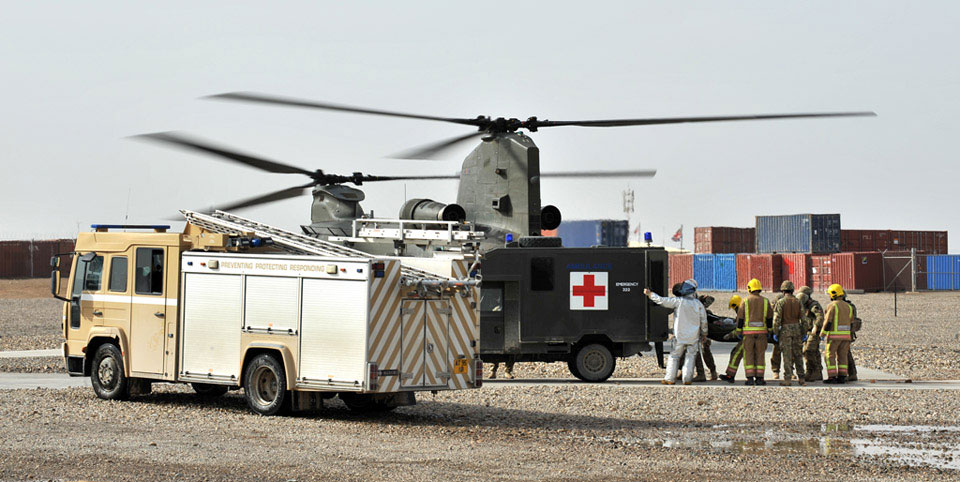 An improvised explosive device (IED) casualty arrives at the Role 3 Hospital, Camp Bastion, Helmand, 2012 (c)