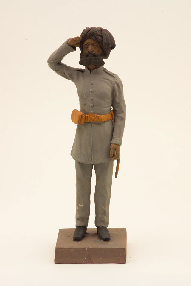 Model of a Sikh soldier of the 15th (Pioneers) Regiment of Punjab Infantry saluting, 1860 (c)