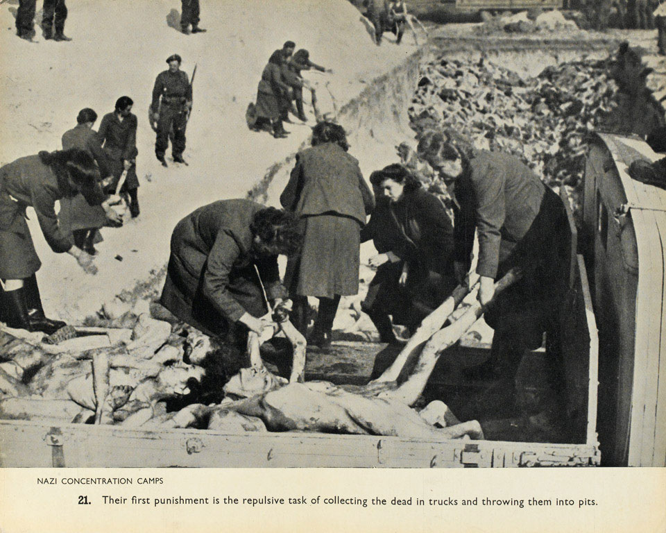 Female SS guards burying their victims at Belsen, April 1945