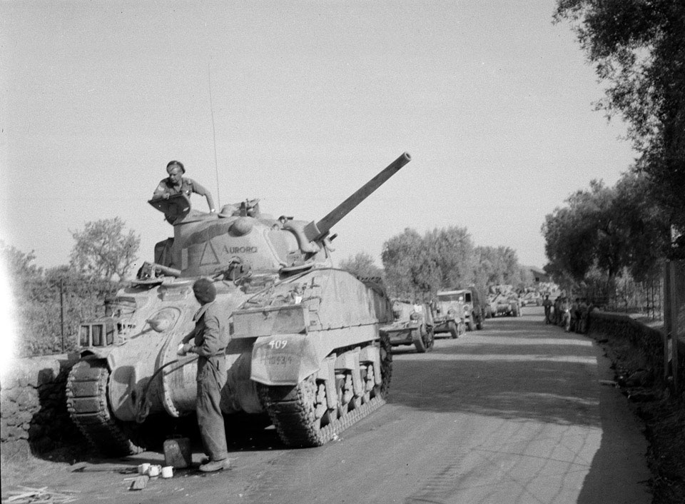 'Halt for a brew', Sherman tank and crew, Sicily, 1943