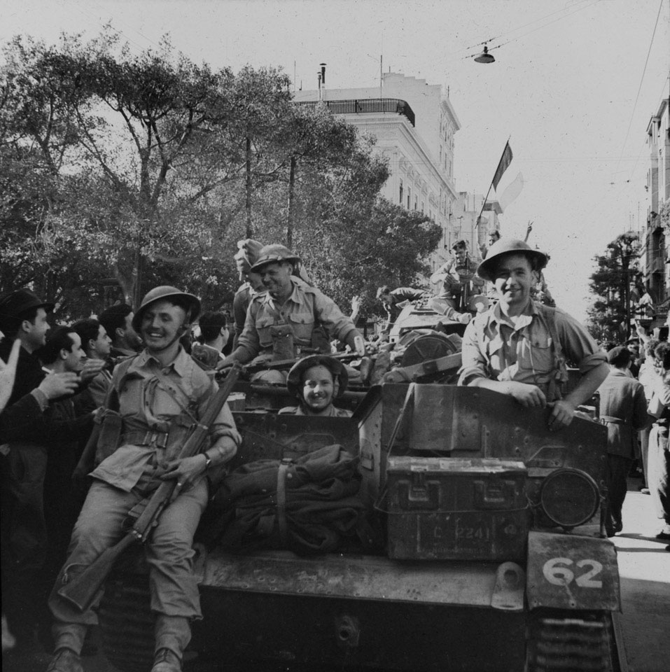 Allied troops being welcomed as they pass through the town of Tunis, May 1943
