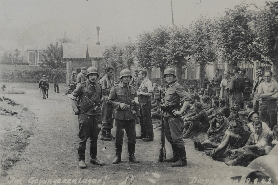 British and Canadian prisoners being guarded by German soldiers, Dieppe, 1942