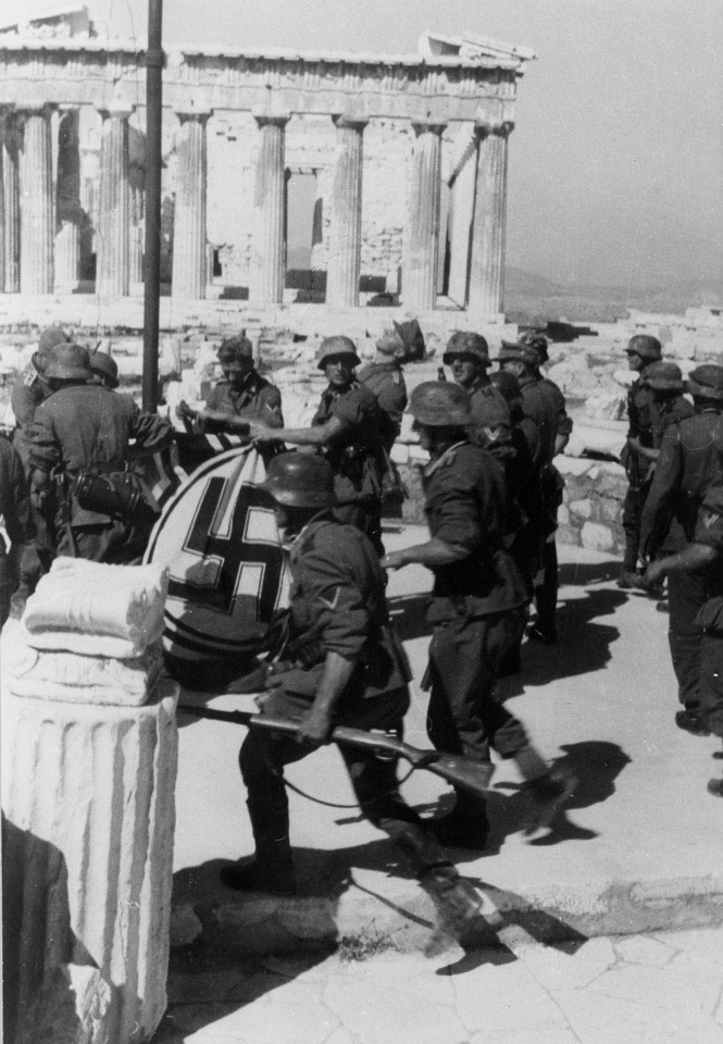 Victorious German soldiers raise the swastika at the Acropolis, Athens, April 1941
