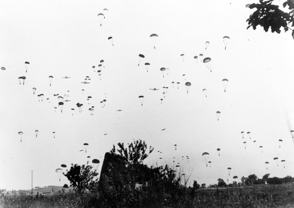 German paratroops and their equipment descend from transport aircraft, Crete, 20 May 1941