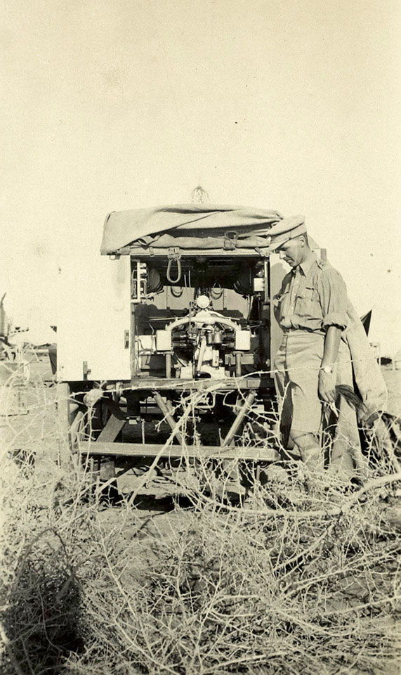 Captain William Leith-Ross next to a wireless wagon station, 1916 (c)