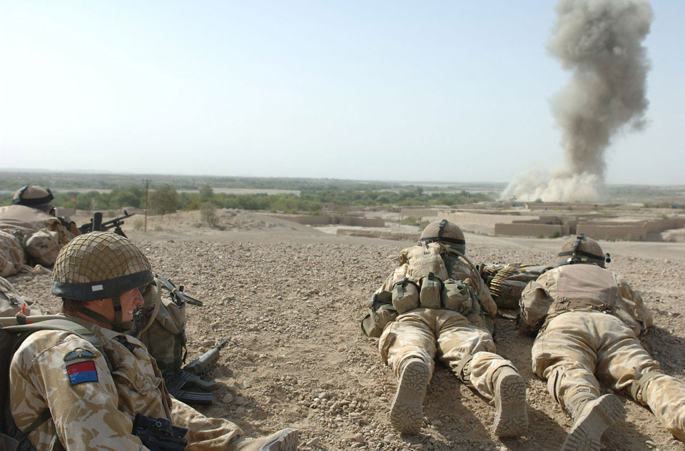 British soldiers watch on as a 500lb bomb is dropped on enemy positions in Musa Qala, 2006