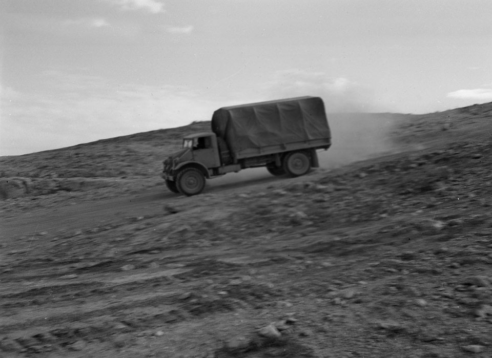 An Allied truck navigates an escarpment, North Africa, 1941 (c)