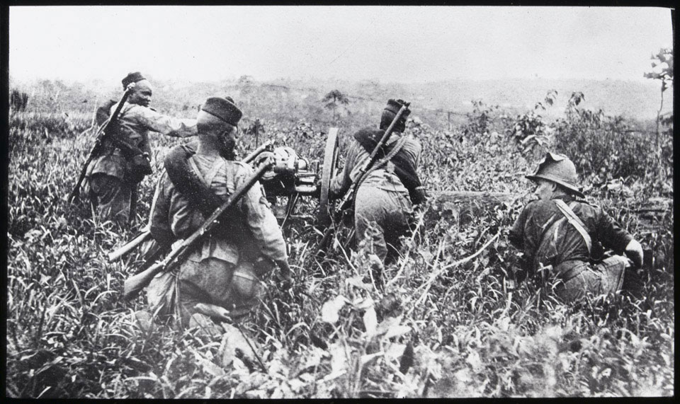 The Nigerian Regiment Artillery under Lieutenant O T Frith with a field gun, 1914 (c)