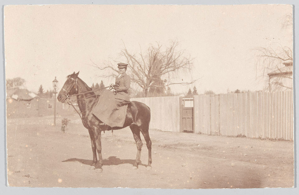A member of the First Aid Nursing Yeomanry on horseback, 1910 (c)
