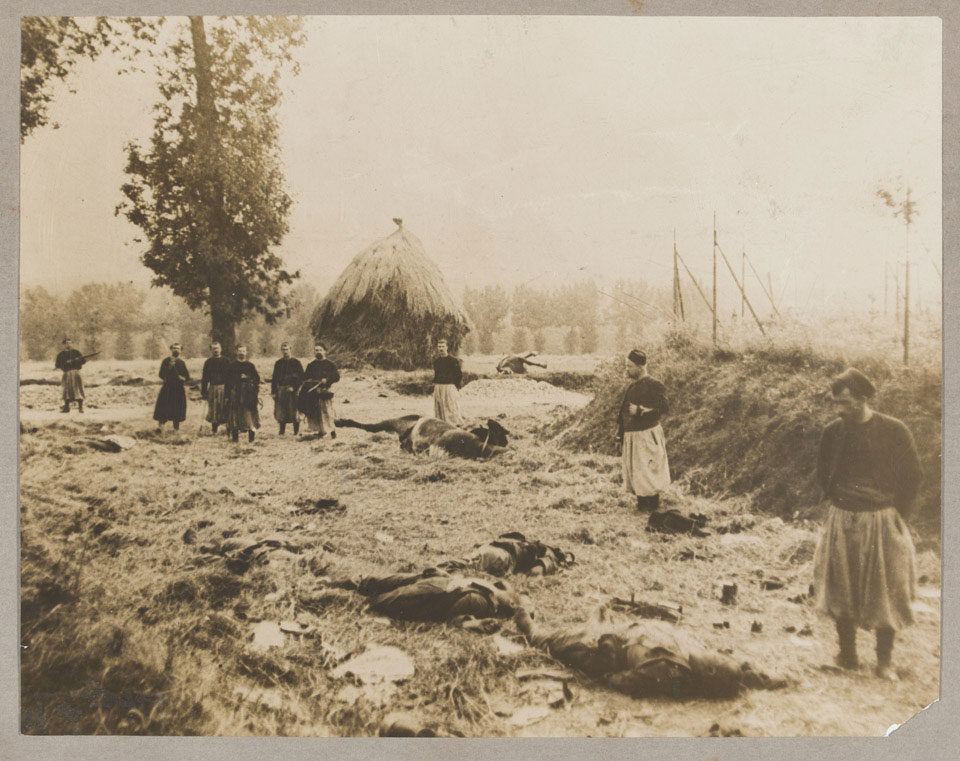 French Zouaves bury German dead at Chemin, 1914