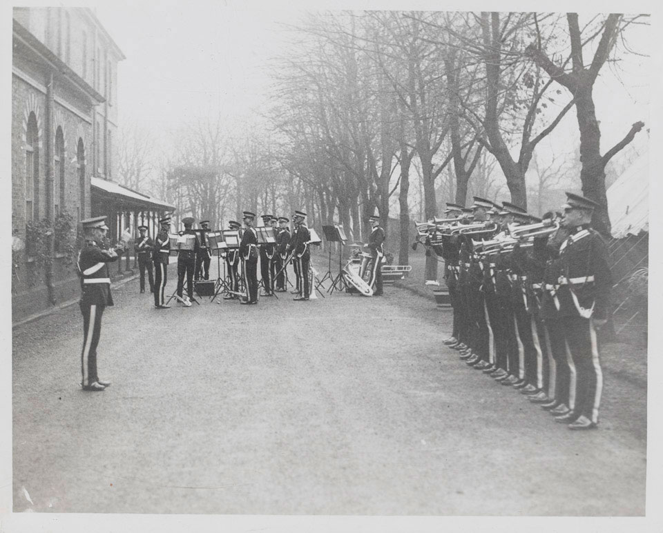 Trumpeters and regimental band, in full dress uniform of the 5th Inniskilling Dragoon Guards, Warburg Barracks, Aldershot, 1930-1933