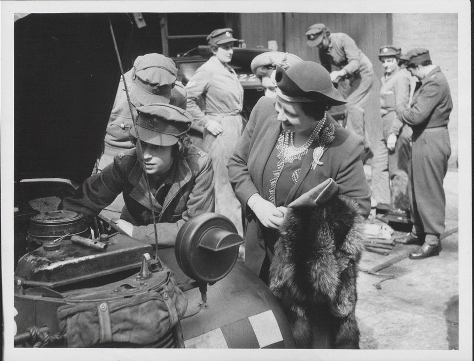 Princess Elizabeth examining the engine of an Austin 10 'Tilly' light ...