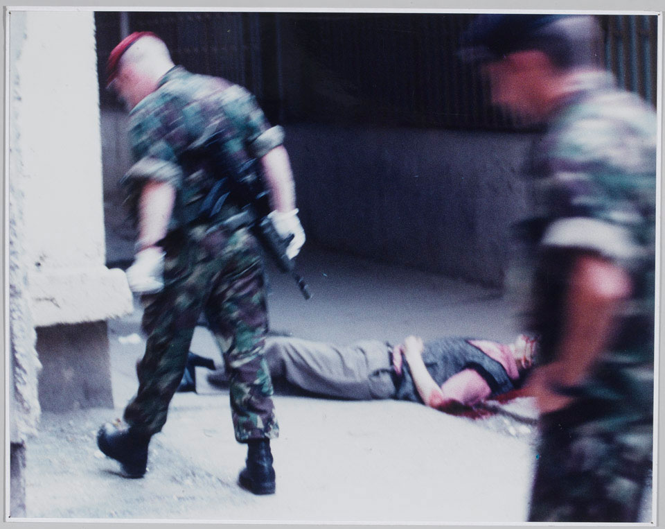 The Royal Military Police at the scene of a murder of a Serbian civilian by an Albanian Kosovan who had recently returned to Pristina, 1999