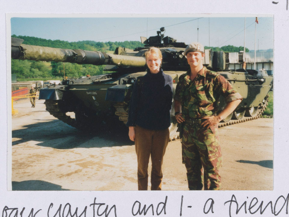 An officer of the Royal Scots Dragoon Guards with a civilian liaison officer in front of a Challenger 1 tank, 1996 (c)
