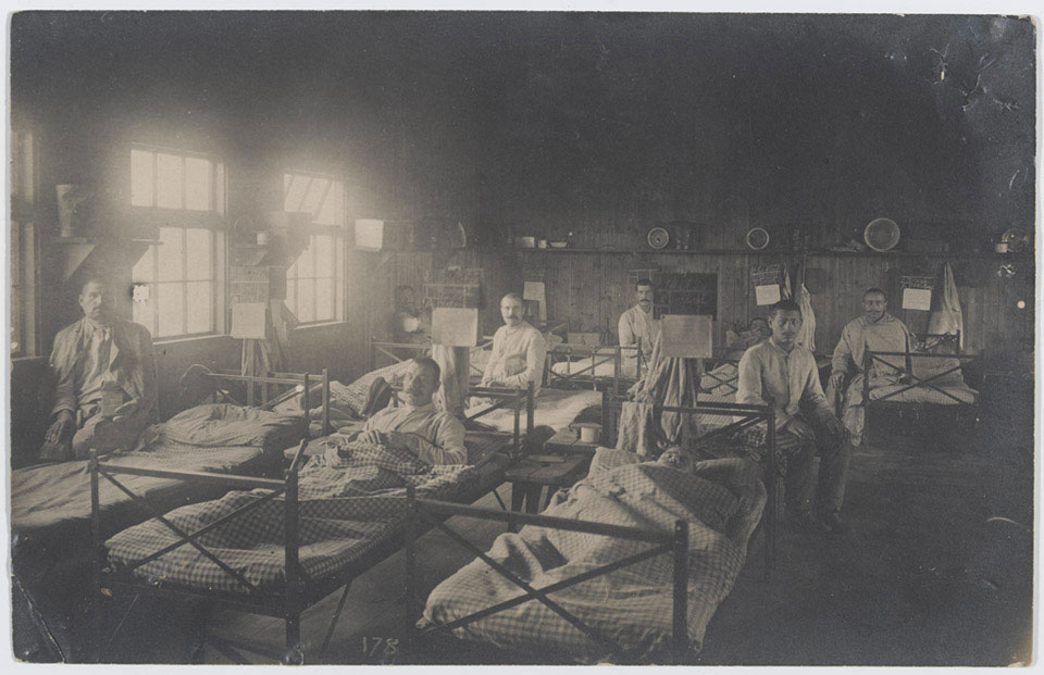 The sorting of mail at Gustrow prisoner of war camp, Germany, 1917 (c)