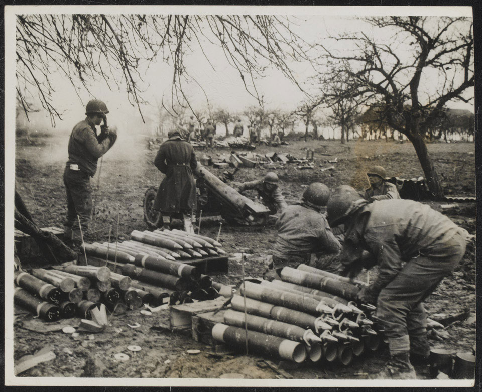 105 mm field guns firing at German positions across the Saar, on the 3rd US Army sector of the front, 1944