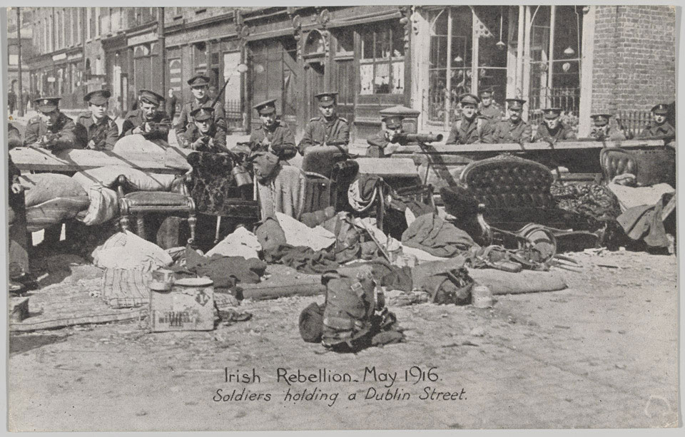 'Irish Rebellion, May 1916. Soldiers holding a Dublin Street'