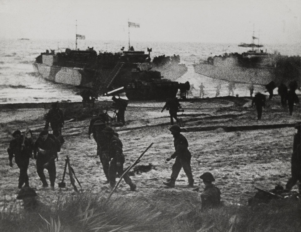 Moving ashore from landing craft at Ouistreham and Bernieres, St Aubin sector, 6 June 1944