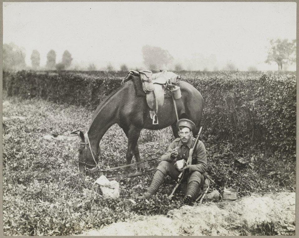 'British cavalry man with a hearty meal', 1914
