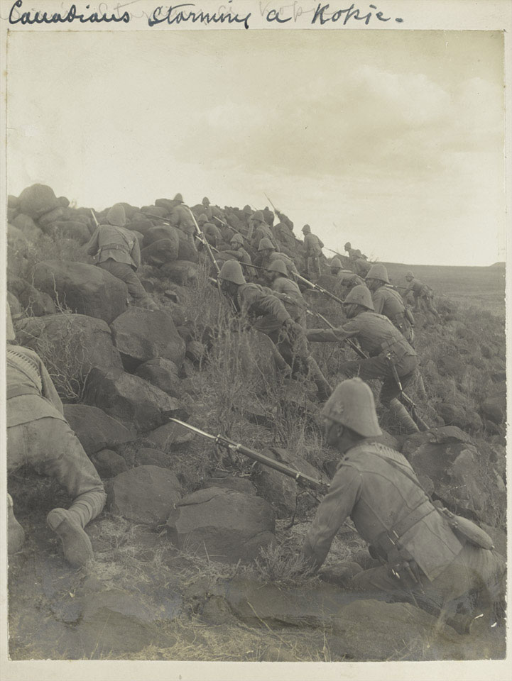 Canadian troops climbing a kopje, 1900 (c)