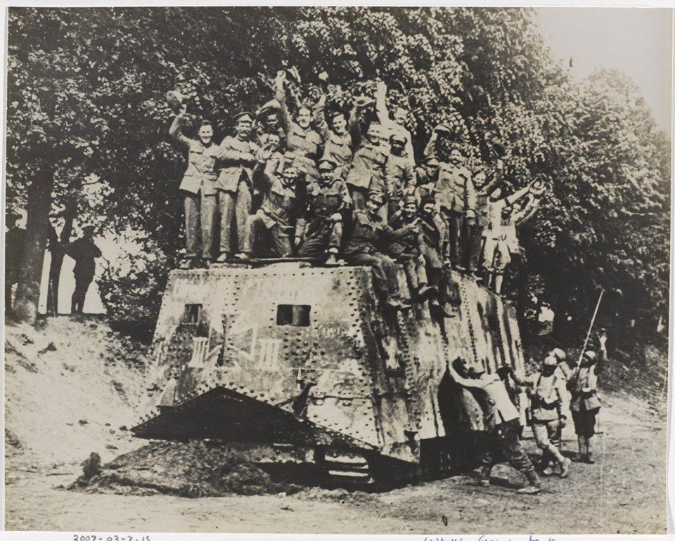 British and Allied soldiers on the roof of a captured A7V tank, 1918