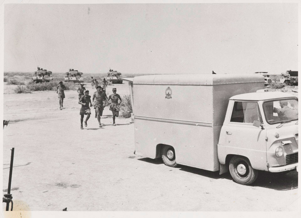 A NAAFI van with Centurion tanks of the 3rd Carabiniers in the background, July 1961