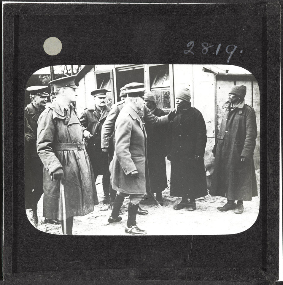 General Jan Smuts visiting African labourers on the Western Front, 1917 (c)
