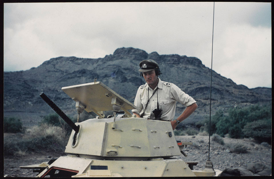 Lieutenant Antony Mallaby, 17th/21st Lancers, in an armoured car, 1962