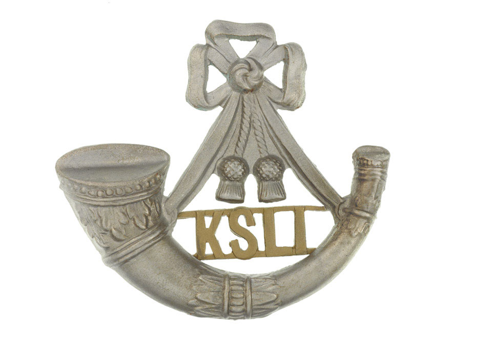 Cap badge worn by Private Edward Astley, The King's Shropshire Light Infantry, 1903 (c)