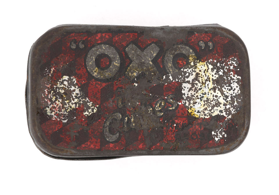 Oxo tin containing a spent bullet and a cardboard Oxo cube box, 1915 (c)